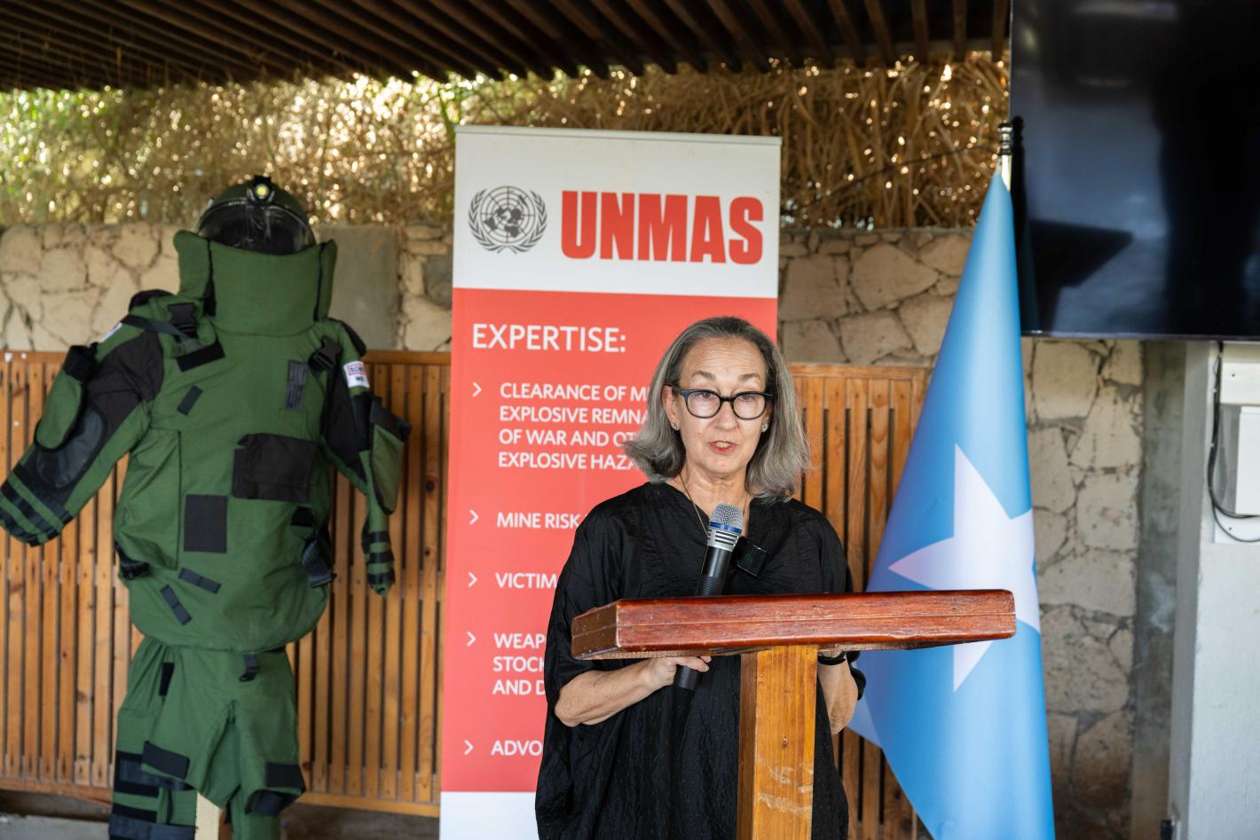 UNMAS Director Ilene Cohn delivers her remarks during a handover event facilitated by UNMAS in Mogadishu. UNMAS Director Ilene Cohn delivers her remarks during a handover event facilitated by UNMAS in Mogadishu.